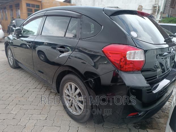 2016 Subaru Impreza in Matt Black with 2.0i engine and Lineartronic CVT.