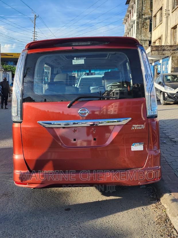 Red 2016 Nissan Serena: Comfort, Style, and Space for All