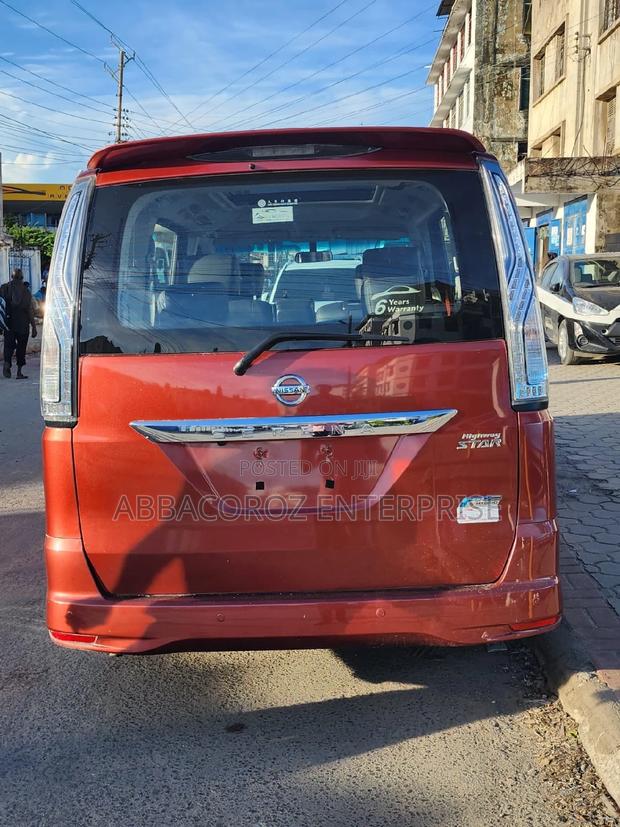 Red 2016 Nissan Serena: Comfort, Style, and Space for All