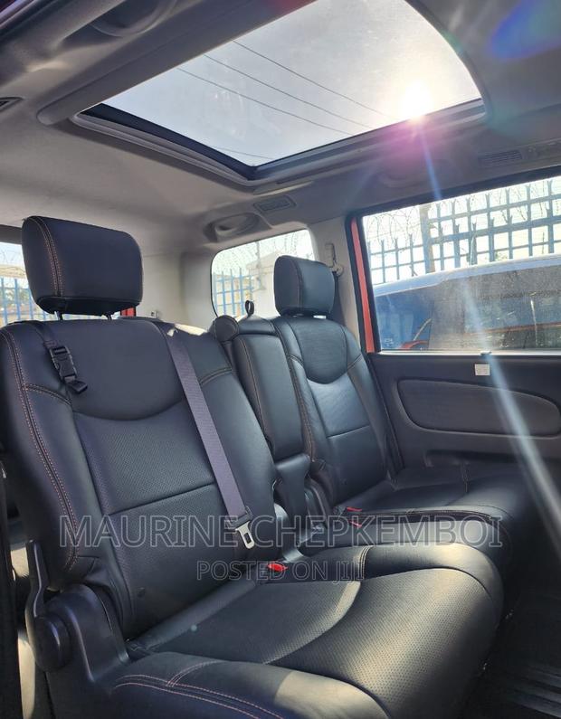 Red 2016 Nissan Serena: Comfort, Style, and Space for All