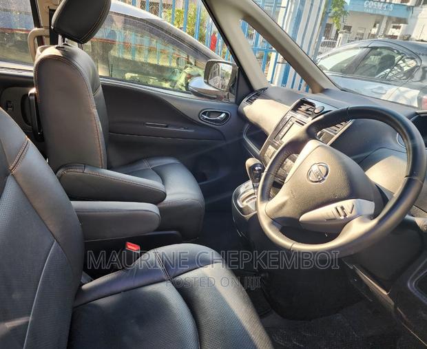 Red 2016 Nissan Serena: Comfort, Style, and Space for All