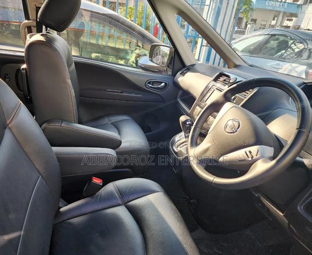 Red 2016 Nissan Serena: Comfort, Style, and Space for All