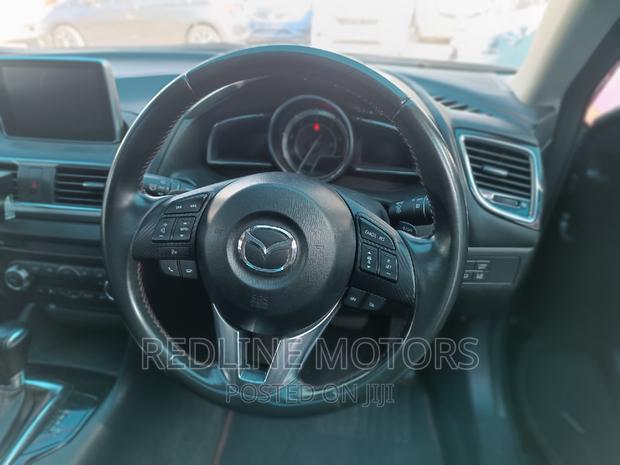 2016 Mazda Axela Blue: Luxury Car for the Masses