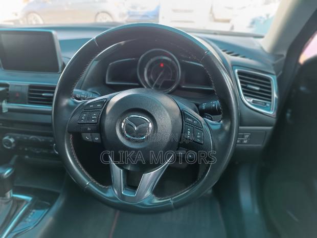 2016 Mazda Axela Blue: Luxury Car for the Masses