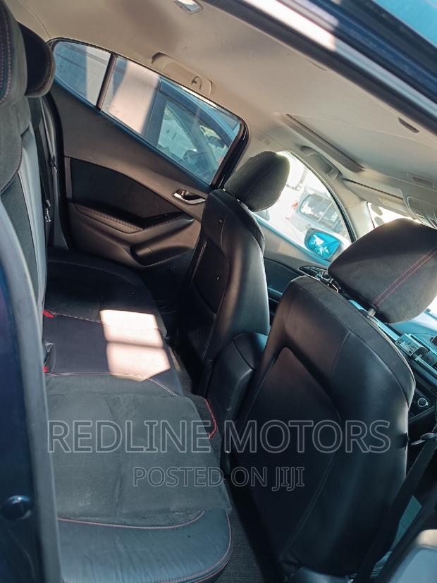 2016 Mazda Axela Blue: Luxury Car for the Masses