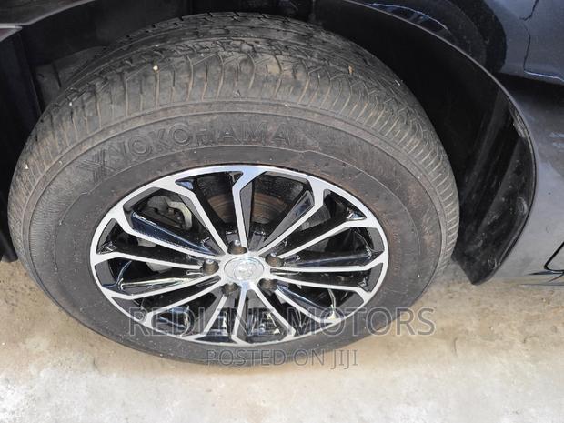 2016 Toyota Premio AWD 1.8 Black: Elegance and Off-road Capability