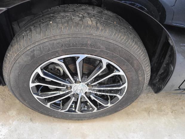 2016 Toyota Premio AWD 1.8 Black: Elegance and Off-road Capability