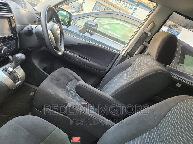 White Nissan Serena 2016: Comfortable and Reliable Minivan