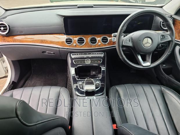 Luxury Used 2016 Mercedes-Benz E400 in Pearl - Excellent Condition
