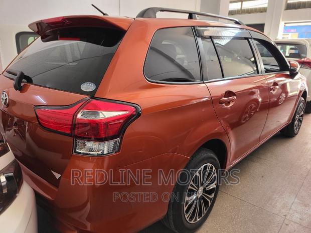 Used 2016 Toyota Corolla Fielder - Bright Orange Color