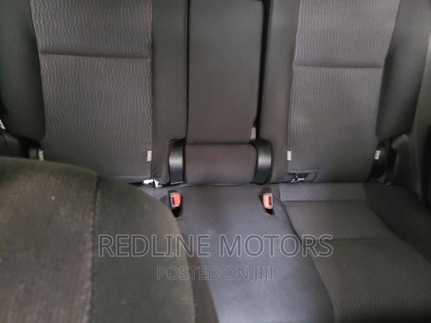 Used 2016 Toyota Corolla Fielder - Bright Orange Color
