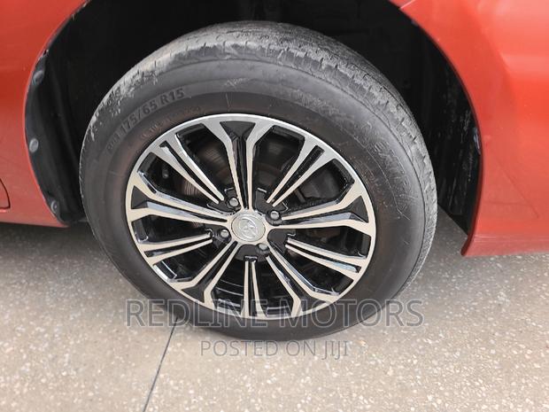 Used 2016 Toyota Corolla Fielder - Bright Orange Color