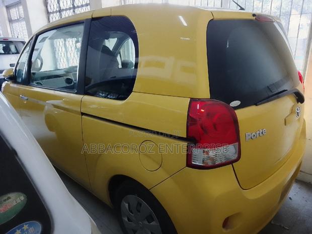 Yellow 2016 Toyota Porte 1.3 FWD - Reliable and Stylish Compact Car