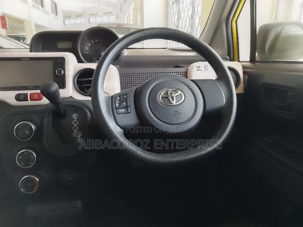 Yellow 2016 Toyota Porte 1.3 FWD - Reliable and Stylish Compact Car