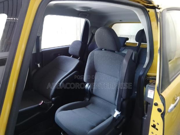 Yellow 2016 Toyota Porte 1.3 FWD - Reliable and Stylish Compact Car