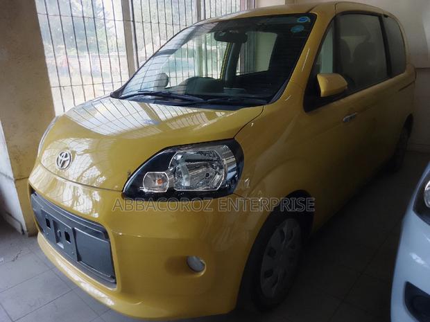 Yellow 2016 Toyota Porte 1.3 FWD - Reliable and Stylish Compact Car
