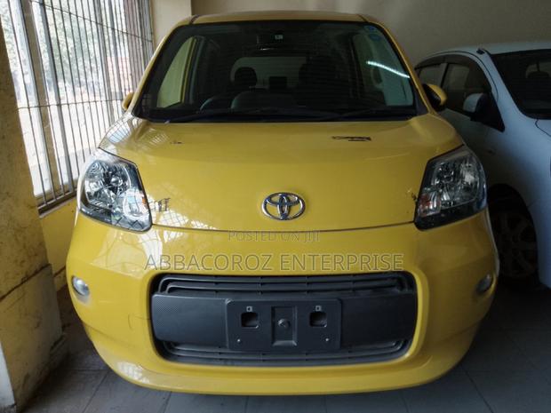 Yellow 2016 Toyota Porte 1.3 FWD - Reliable and Stylish Compact Car