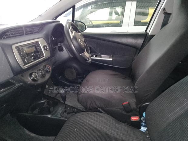 Ivory Toyota Vitz (2016): Stylish Compact Car at a Bargain!
