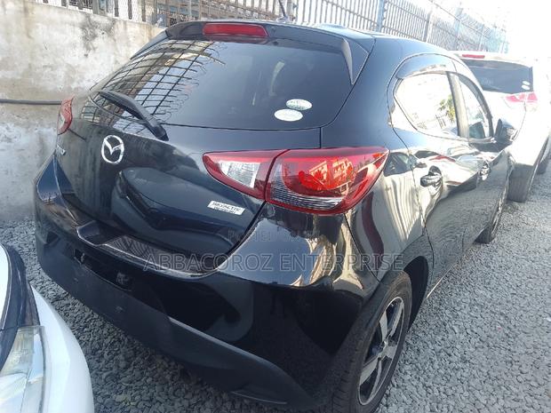Modern 2016 Mazda Demio Black: Affordable Compact Car with Style