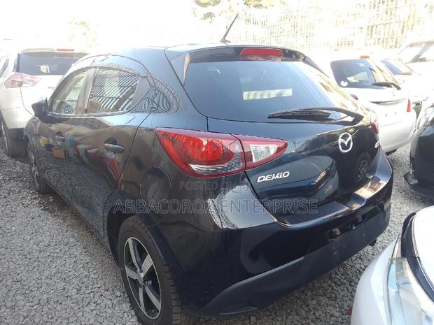 Modern 2016 Mazda Demio Black: Affordable Compact Car with Style