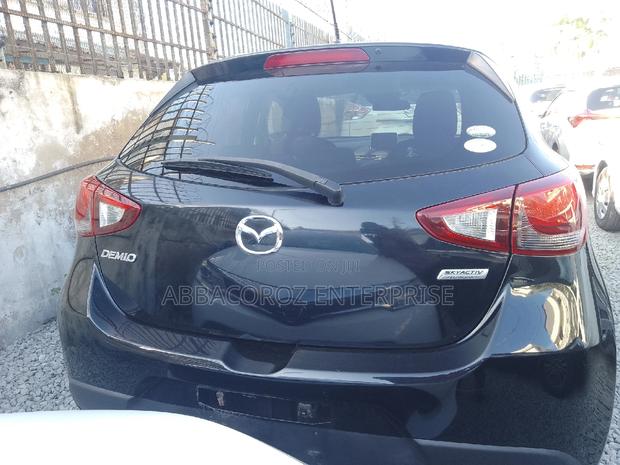 Modern 2016 Mazda Demio Black: Affordable Compact Car with Style