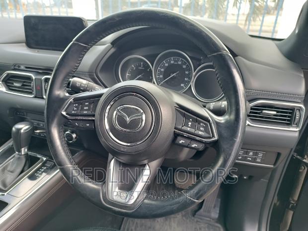 Black Mazda CX-8 2.5 25t AWD: Luxury 7-seater SUV available for purchase