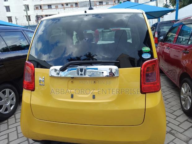 Yellow Honda N-One 2016: Stylish, Compact, and Budget-Friendly