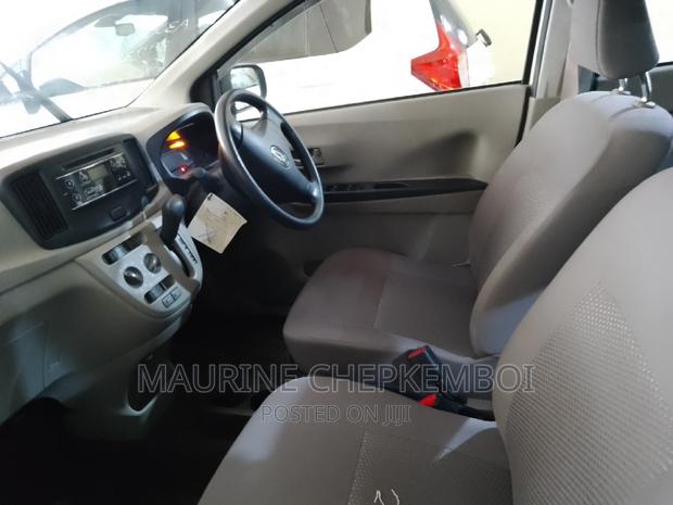 White 2016 Daihatsu Mira - Compact Car with Modern Aesthetics