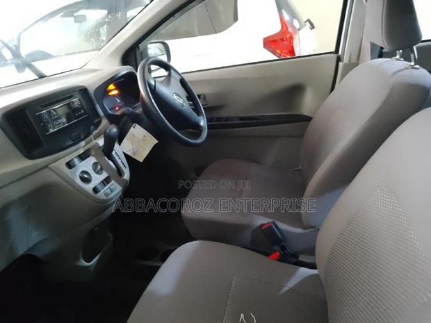 White 2016 Daihatsu Mira - Compact Car with Modern Aesthetics