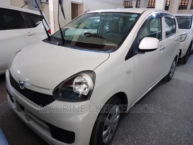 White 2016 Daihatsu Mira - Compact Car with Modern Aesthetics
