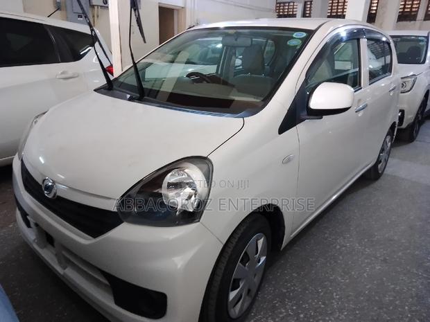 White 2016 Daihatsu Mira - Compact Car with Modern Aesthetics