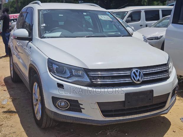 Pre-owned 2016 Volkswagen Tiguan SE FWD in White - Quality and Value Guaranteed!