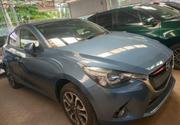 Teal Mazda Demio 2016: Compact Car with Style and Comfort for sale