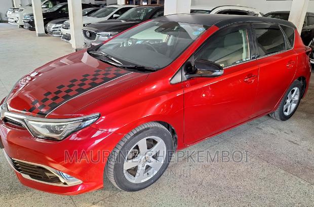 Red 2017 Toyota Auris: Spacious and Efficient Compact Sedan