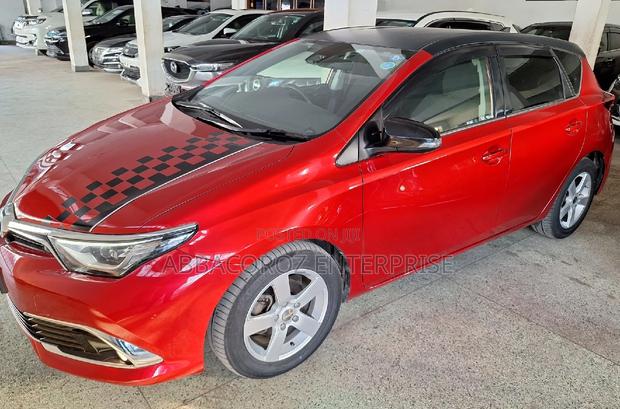 Red 2017 Toyota Auris: Spacious and Efficient Compact Sedan