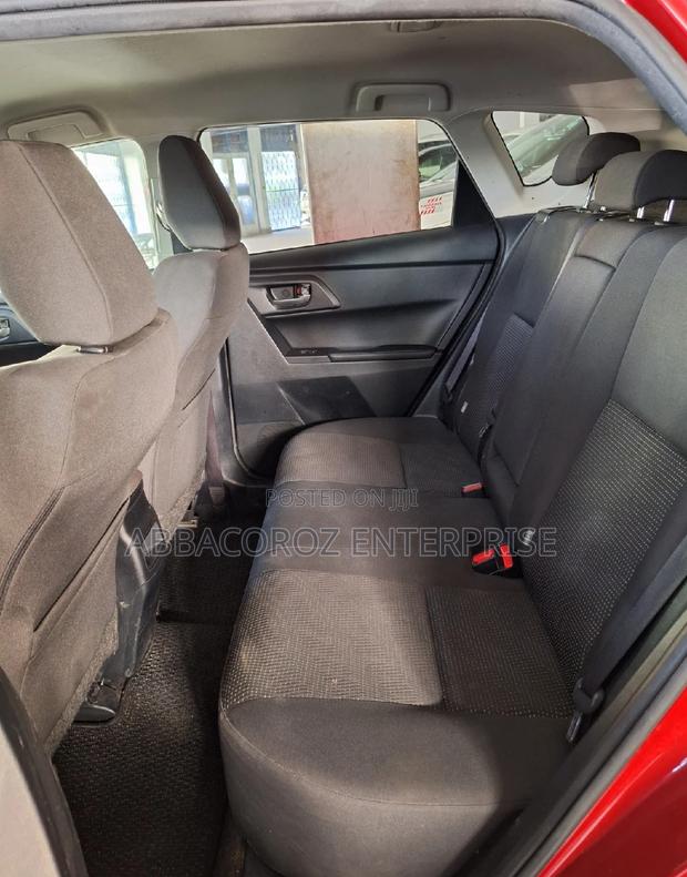 Red 2017 Toyota Auris: Spacious and Efficient Compact Sedan