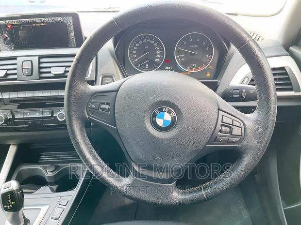 2016 BMW 118i White Sedan: Luxury and Performance
