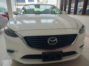 Ivory-Colored 2016 Mazda Axela - Used Car Listing for sale