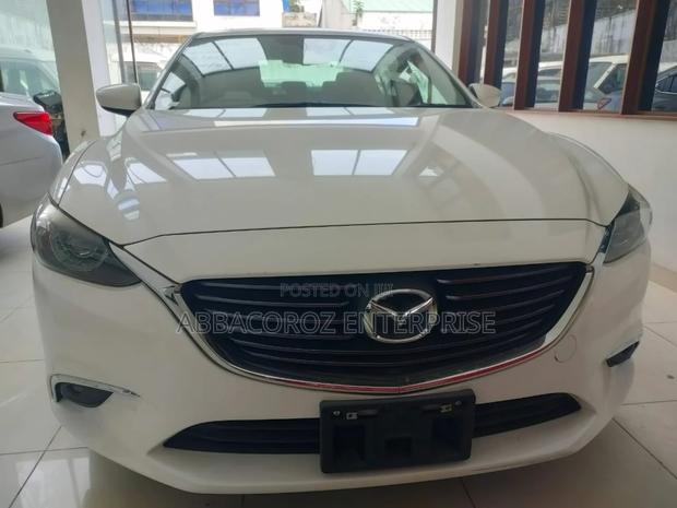 Ivory-Colored 2016 Mazda Axela - Used Car Listing