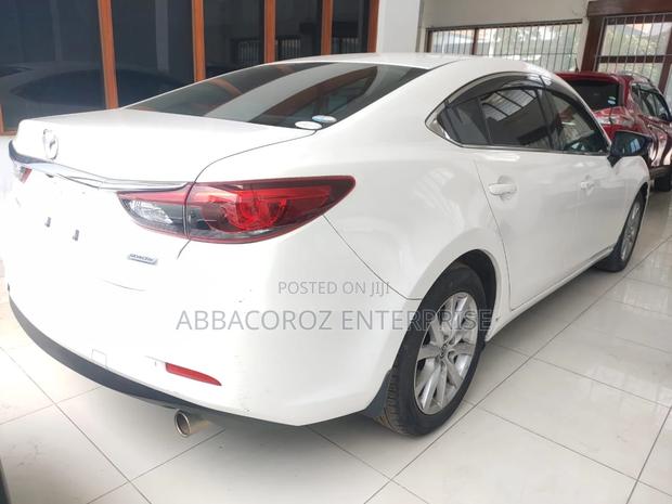 Ivory-Colored 2016 Mazda Axela - Used Car Listing