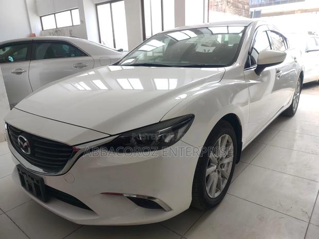 Ivory-Colored 2016 Mazda Axela - Used Car Listing