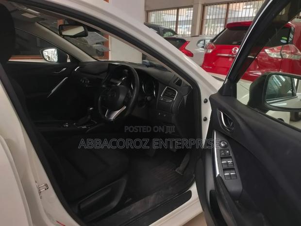 Ivory-Colored 2016 Mazda Axela - Used Car Listing
