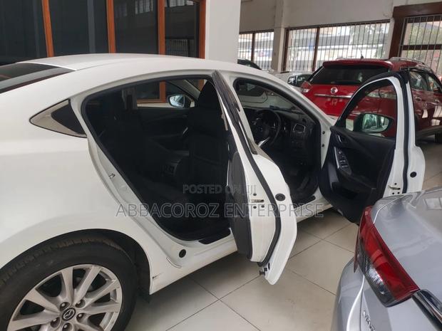 Ivory-Colored 2016 Mazda Axela - Used Car Listing