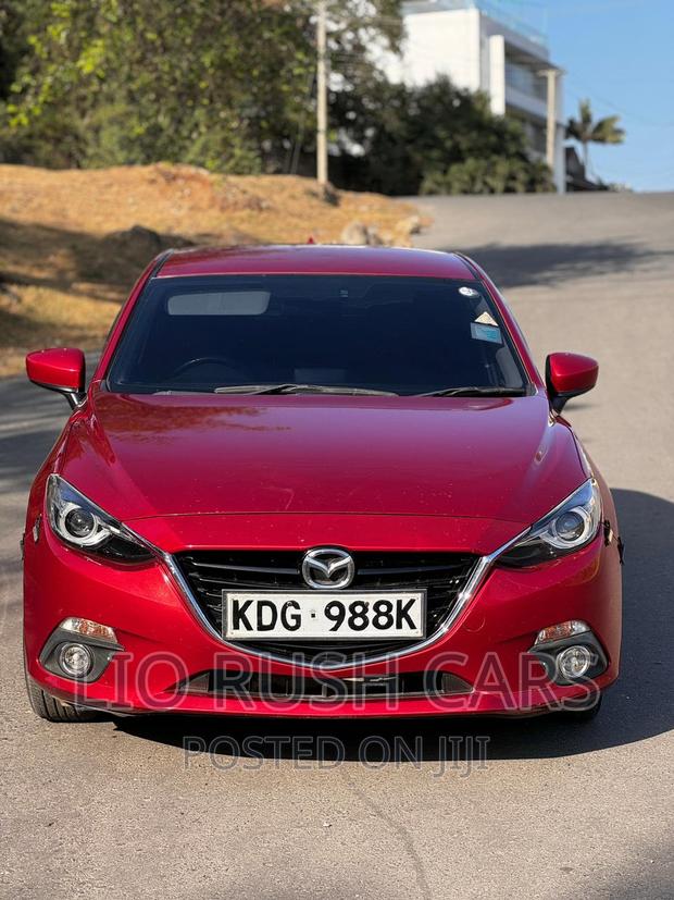 Premium 2014 Mazda Axela SV in Red - Performance and Luxury