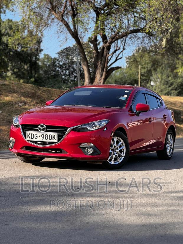 Premium 2014 Mazda Axela SV in Red - Performance and Luxury