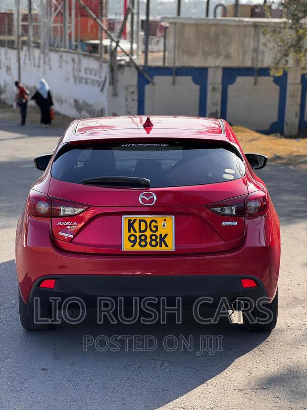 Premium 2014 Mazda Axela SV in Red - Performance and Luxury