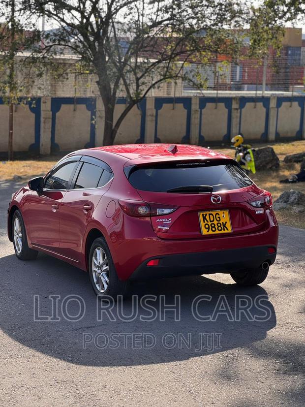 Premium 2014 Mazda Axela SV in Red - Performance and Luxury