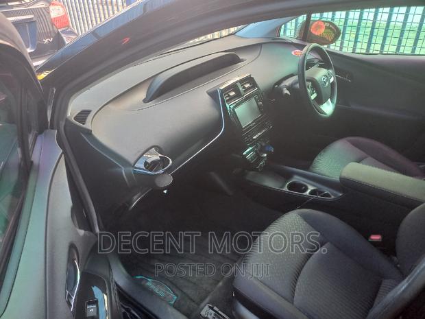 Black 2018 Toyota Prius Four Touring - Hybrid Vehicle with Luxury
