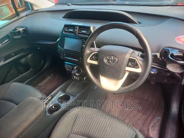 Black 2018 Toyota Prius Four Touring - Hybrid Vehicle with Luxury