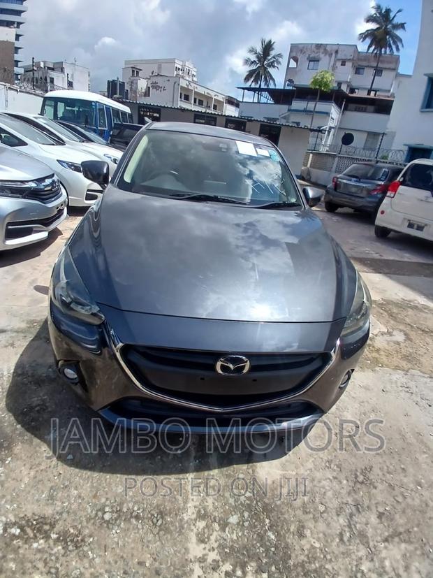 Gray Mazda Demio 2017 - Compact Car with High-Tech Features and Low Emissions